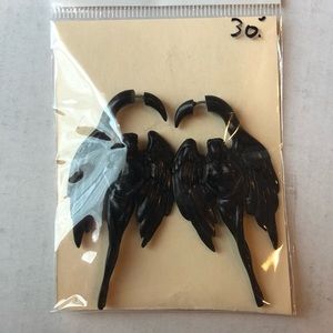 Fake gauge carved nude angels